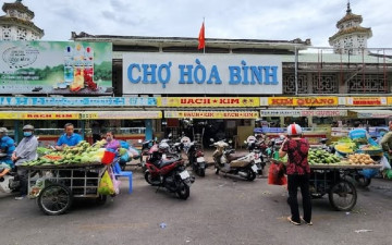 Hoa Binh Market: A Deep Dive into District 5’s Cultural and Culinary Heart